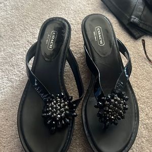 Coach platform flip flop Sandals in black with beaded embellishments